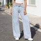 Gerade geschnittene Jeans mit hoher Taille und Schleifenstickerei