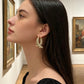 📢📢40% OFF !! ⏰Women’s Elegant Twisted Gold Hoop Earrings